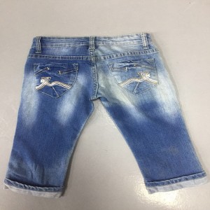 dreng vender op med lige ben med broderi, syning af lomme jeans WSG006
