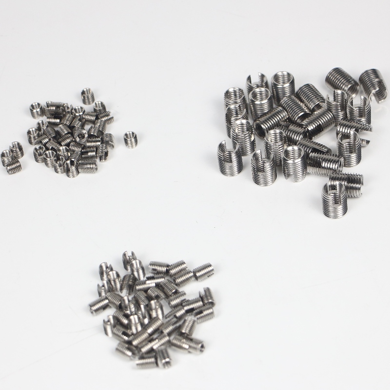 302 000 200.500 302 M20 * 2,5 * 26 * 1,5 * 27L selvskærende gevindindsatser med skærespalte