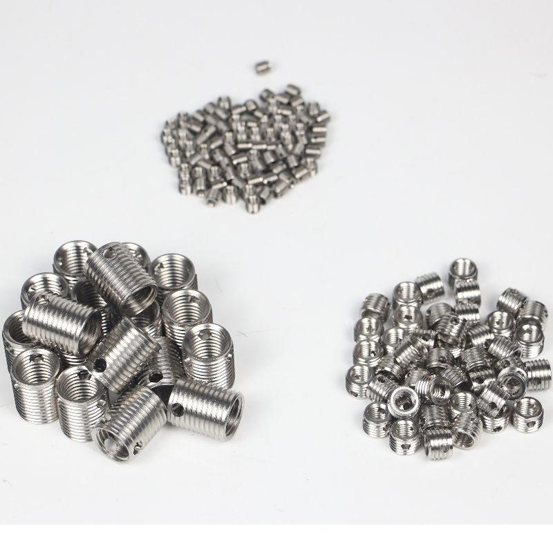 308 000 030.500 308 M3 * 0,5 * 5 * 0,6 * 6Selvtagende gevindindsatser med 3 huller uden buer 500K lager