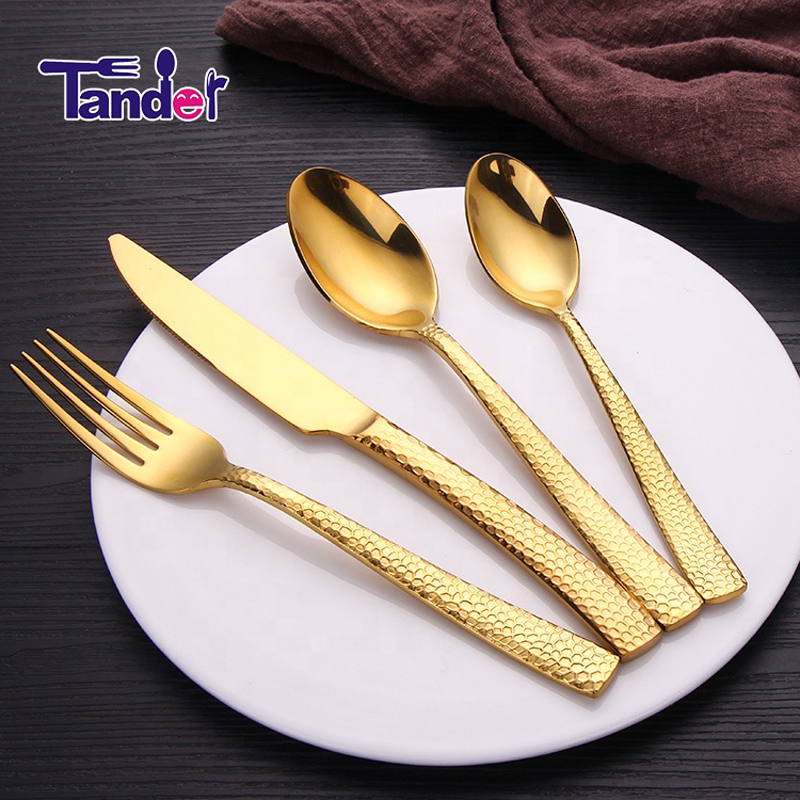 kreativ design af skinnende guld bestik af spiseartikler