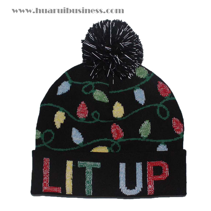 Patrone med acryl, acryl-strikhue, tuque, vinterhue, hue med hue, hue med manchet, med jacquart af bladblade og bogstaver, med kerneskaller, inde i pom-pom og jacquand med reflektiv virkning