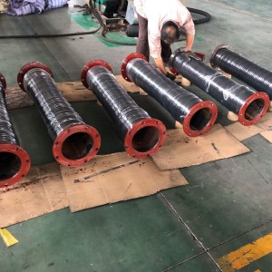 Rørslanger med fleksibel slurrør til beholder