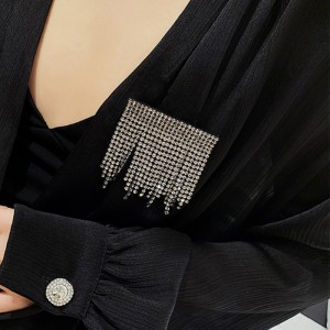 Temperaturen fuld af borets tassel-broche