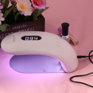 Kvinde kan holde halvdelen af ​​himmellysbehandlingslampen Rainbow 2