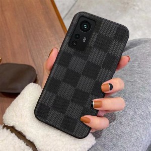 Det er velegnet til Xiaomi12Pro Luxury Mobile Phone Case. Det er helt indpakket med stort brand imitation læder for hånd. Det er et efterårsbevis og ridsesikker beskyttende læderhus