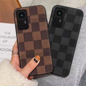 Det er velegnet til Xiaomi12Pro Luxury Mobile Phone Case. Det er helt indpakket med stort brand imitation læder for hånd. Det er et efterårsbevis og ridsesikker beskyttende læderhus