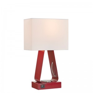 Lille skrivebordslampe med rød finish, en USB -opladningsport, en trådløs opladningsstation og en på/off rockerkontakt på værelsesrummet